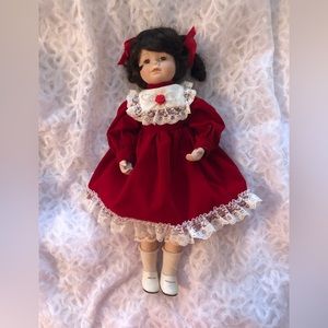 Vintage porcelain doll in good condition, 16”
